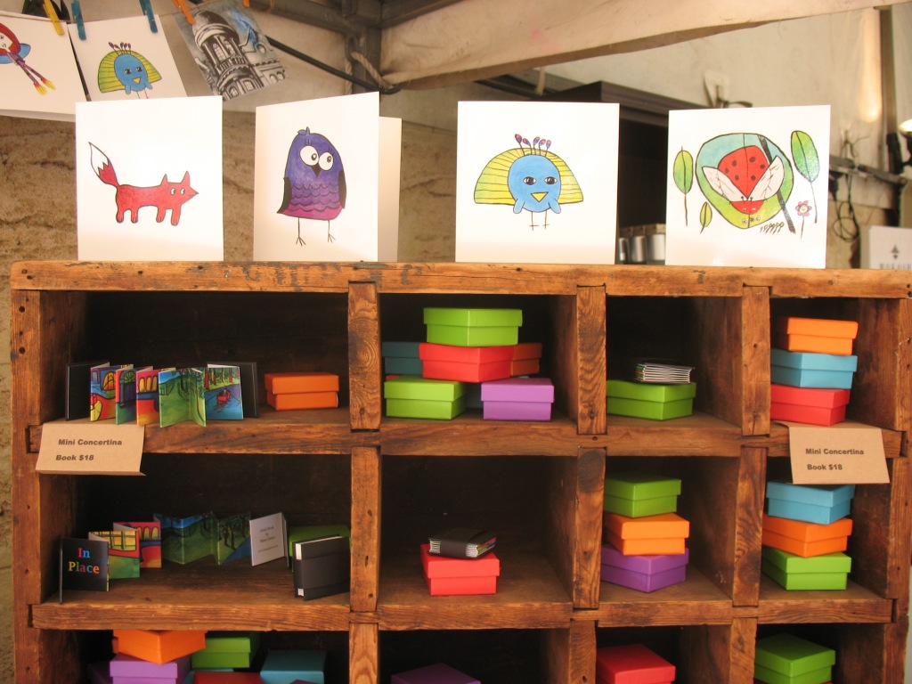 Mini artists books on display at bazaar.
